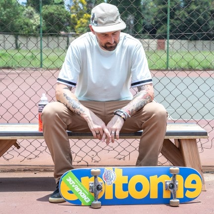 Skater with board and energy drink